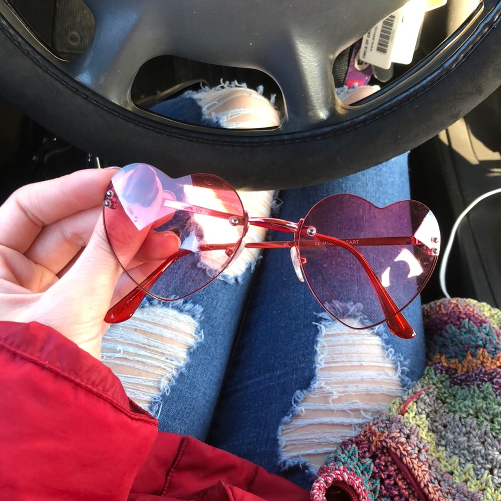 Heart-shaped pink sunglasses